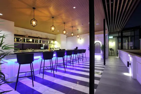 Villa De Khaosan rooftop bar at night