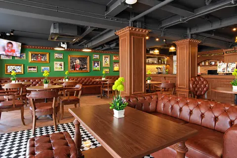 Restaurant lounge and sports-themed wall